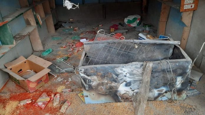 A smashed refrigerator and damaged items at a shop in Nasrullah Pora village in Budgam, Jammu and Kashmir, Thursday | Photo: Azaan Javaid | ThePrint