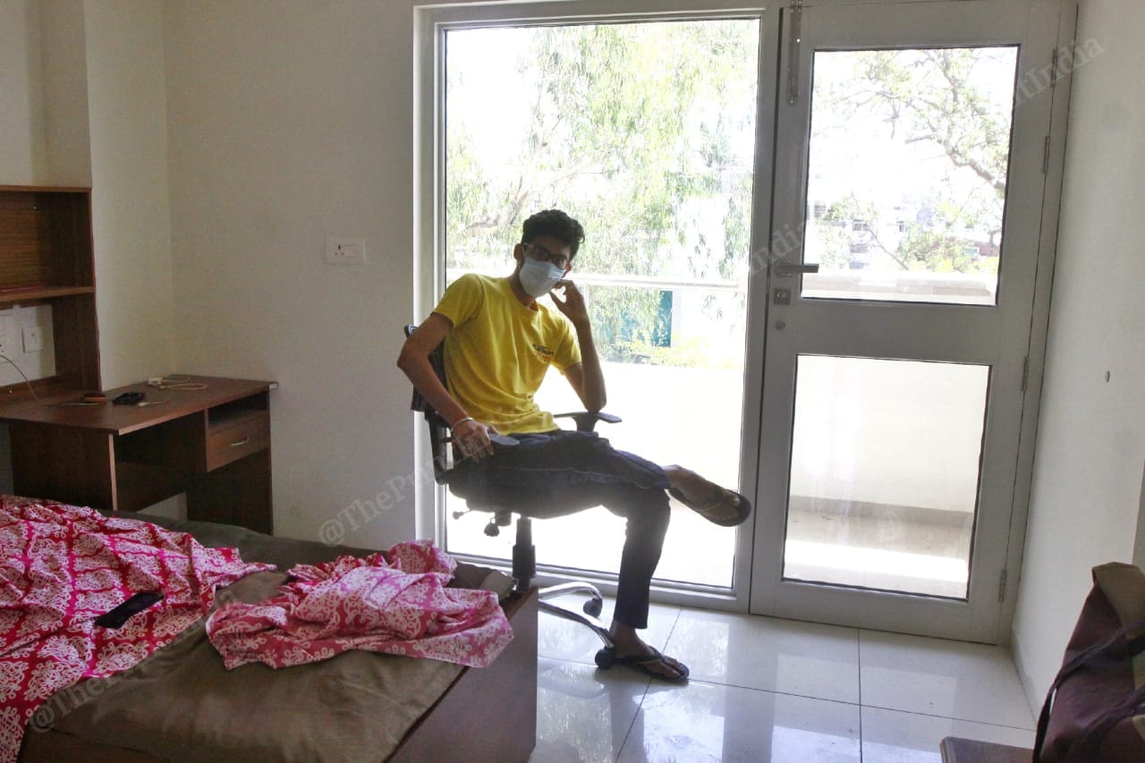 Jai Patni inside his bedroom at the quarantine centre in Vadodra | Photo by Praveen Jain