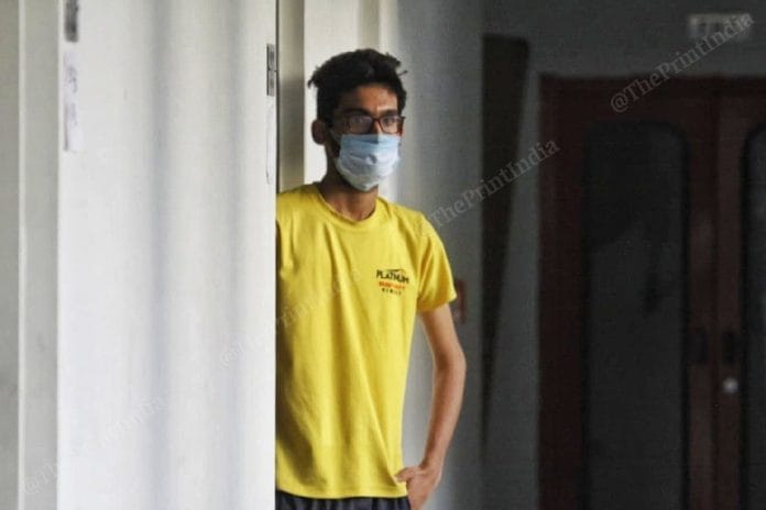 Jai Patni outside his bedroom at the quarantine centre in Vadodara | Photo by Praveen Jain