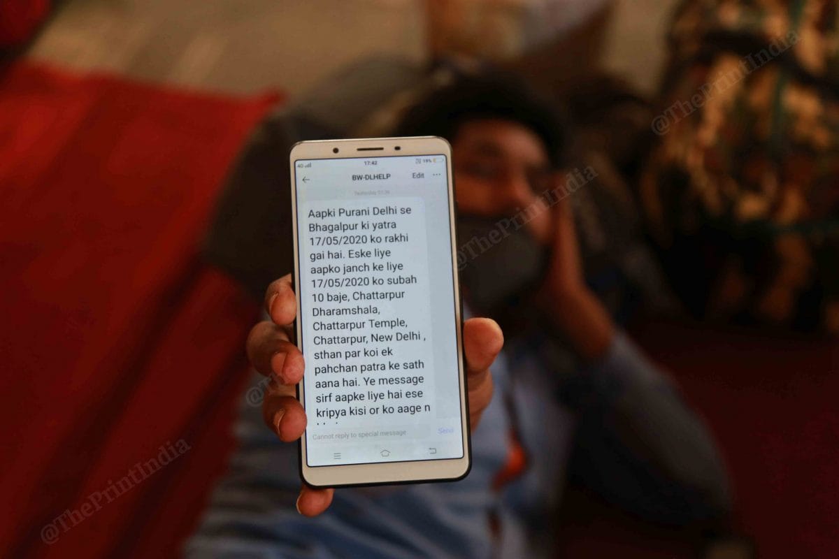 A workers shows a message he received | Photo: Manisha Mondal | ThePrint