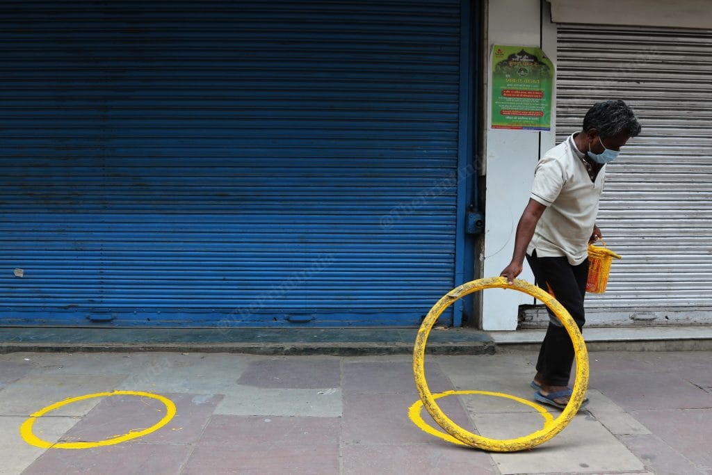 Circles were outside an alcohol shop in Daryaganj Tuesday as a precautionary measure as the shop was supposed to open next day | Photo: Manisha Mondal | ThePrint