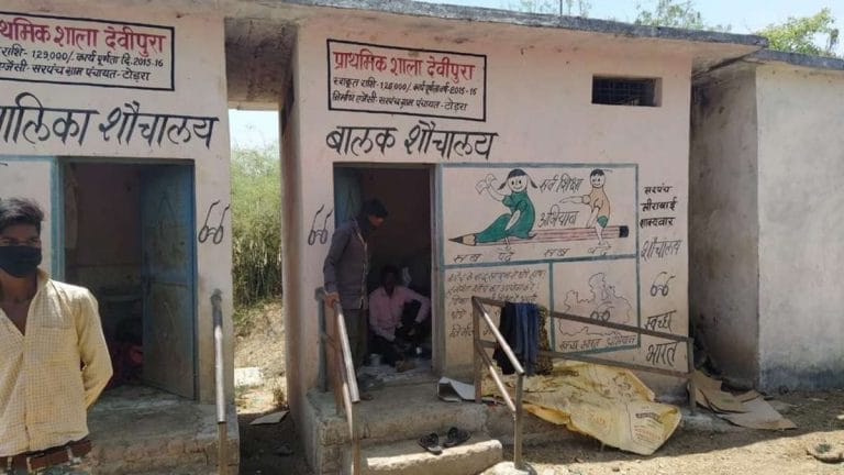 Viral images show MP labourers ‘quarantined’ in toilet, but BJP says it’s not what it seems