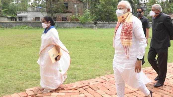 PM Narendra Modi, WB Chief Minister Mamta Banerjee and Governor Jagdeep Dhankar visit cyclone Amphan affected areas & attend an administrative meeting at Basirhat College in West Bengal Friday. | CMO