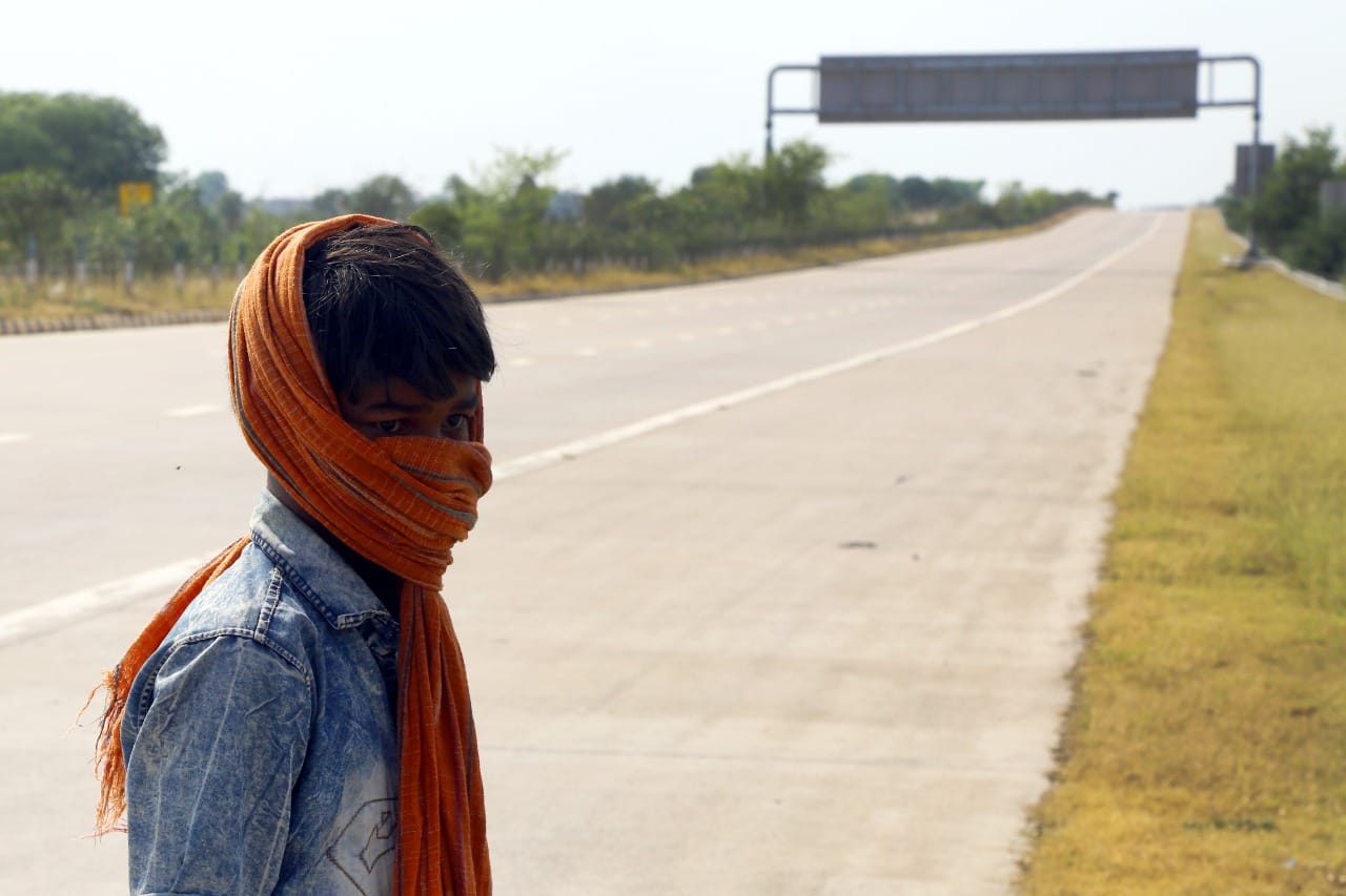 A migrant labourer at the Yamuna Expressway. He was on his way to Bihar from Sonepat on a cycle | Photo: Suraj Singh Bisht | ThePrint