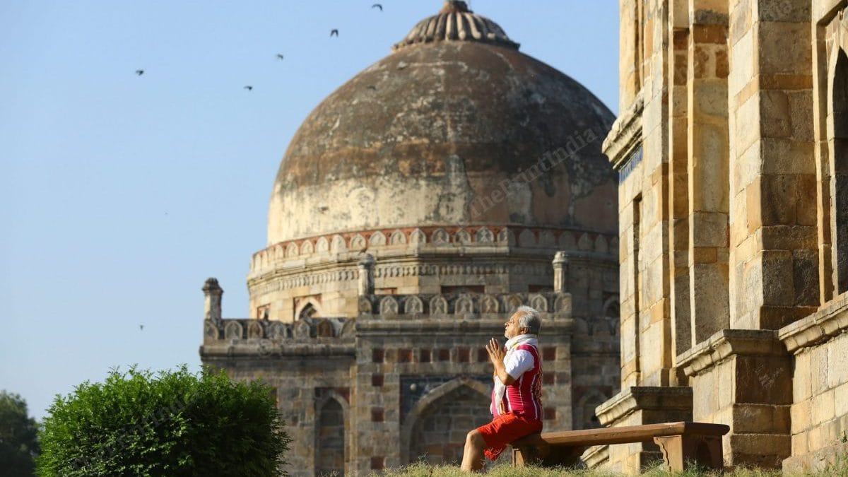 A man practising Yoga in Lodhi Garden | Photo: Suraj Singh Bisht | ThePrint