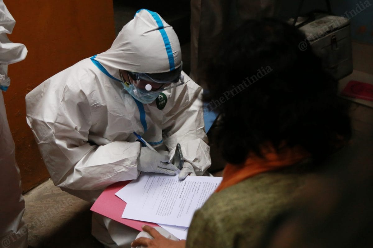 The workers use a mobile app to store all the data they acquire during the course of their survey. As a backup, for example if their phone runs out of battery while they are out in the field, there are forms for registration | Manisha Mondal | ThePrint