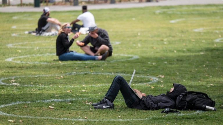 Covid flares in new US hot spots as Americans let guard down