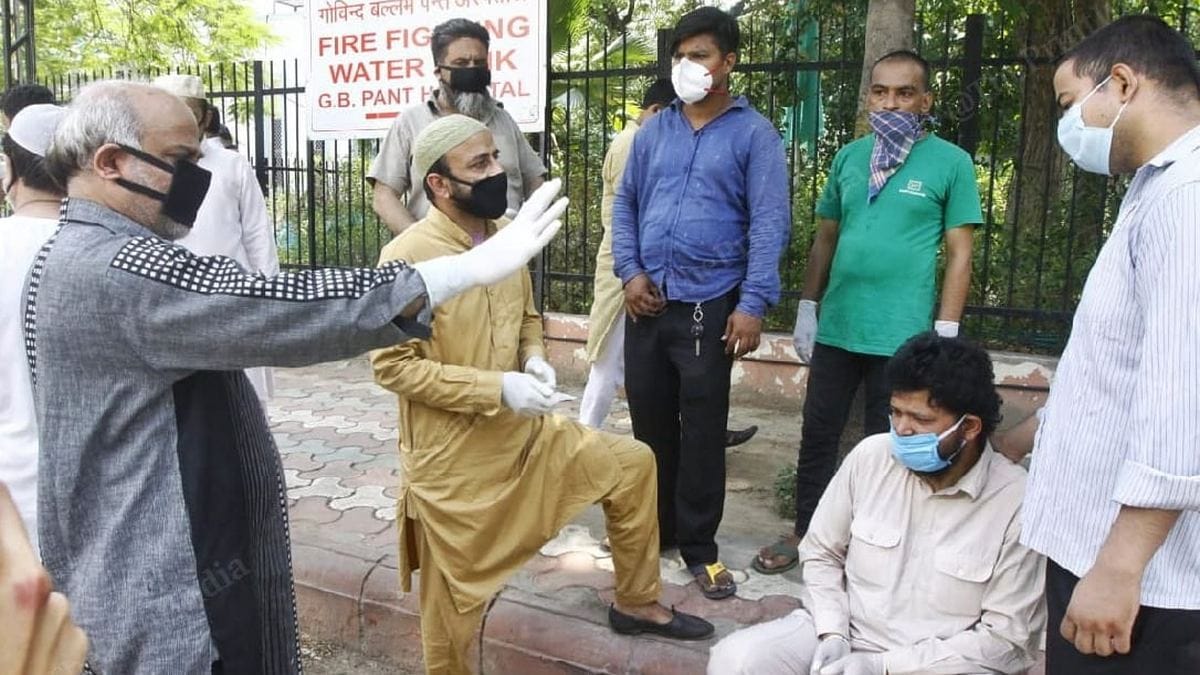 The two Moinuddins' families speaking to each other Sunday | Photo: Praveen Jain | ThePrint