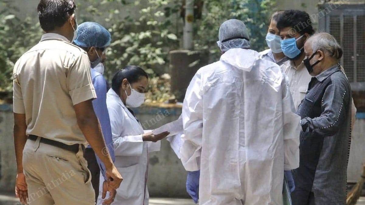 Mortuary in-charge Dr Amandeep Kaur speaks to the aggrieved families Sunday | Photo: Praveen Jain | ThePrint