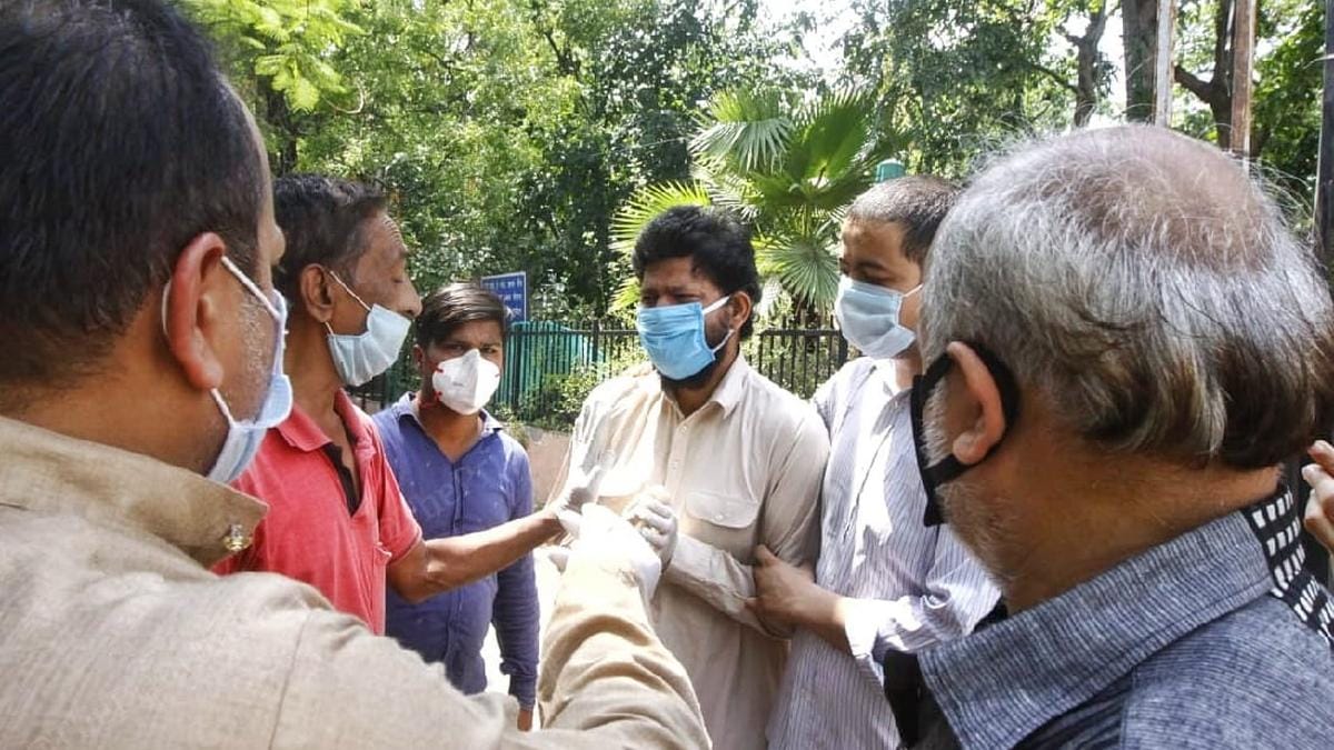 Kalamuddin breaks down upon realising the body he buried Saturday was not his father's | Photo: Praveen Jain | ThePrint