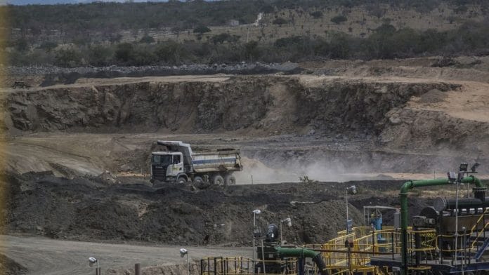A truck drives through the open pit at the Lipari Mineracao Ltda. Brauna Diamond Mine in the Municipality of Nordestina, State of Bahia, Brazil | Photographer: Dado Galdieri | Bloomberg