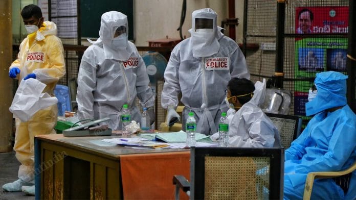 Hyderabad Police constables inside the Covid-19 ward at Gandhi Hospital, a nodal Covid centre in the city, after a doctor was assaulted while on duty | Photo: Suraj Singh Bisht | ThePrint.
