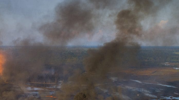 An aerial view of the Baghjan oil field engulfed in fire in Tinsukia, Assam on 9 June