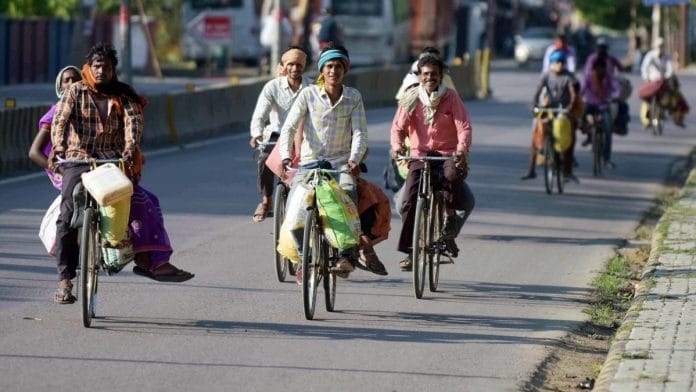 A file photo of migrant workers cycling to Chhattisgarh from Prayagraj during the lockdown. | Photo: ANI