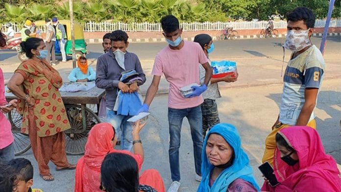 Migrant Travel Support gave cooked and packaged food to migrant workers before, during and after their journey home | Twitter @MigrantTravel