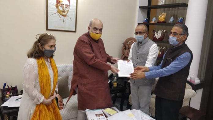 The Call of Justice team presenting its fact-finding report to Amit Shah | By special arrangement.