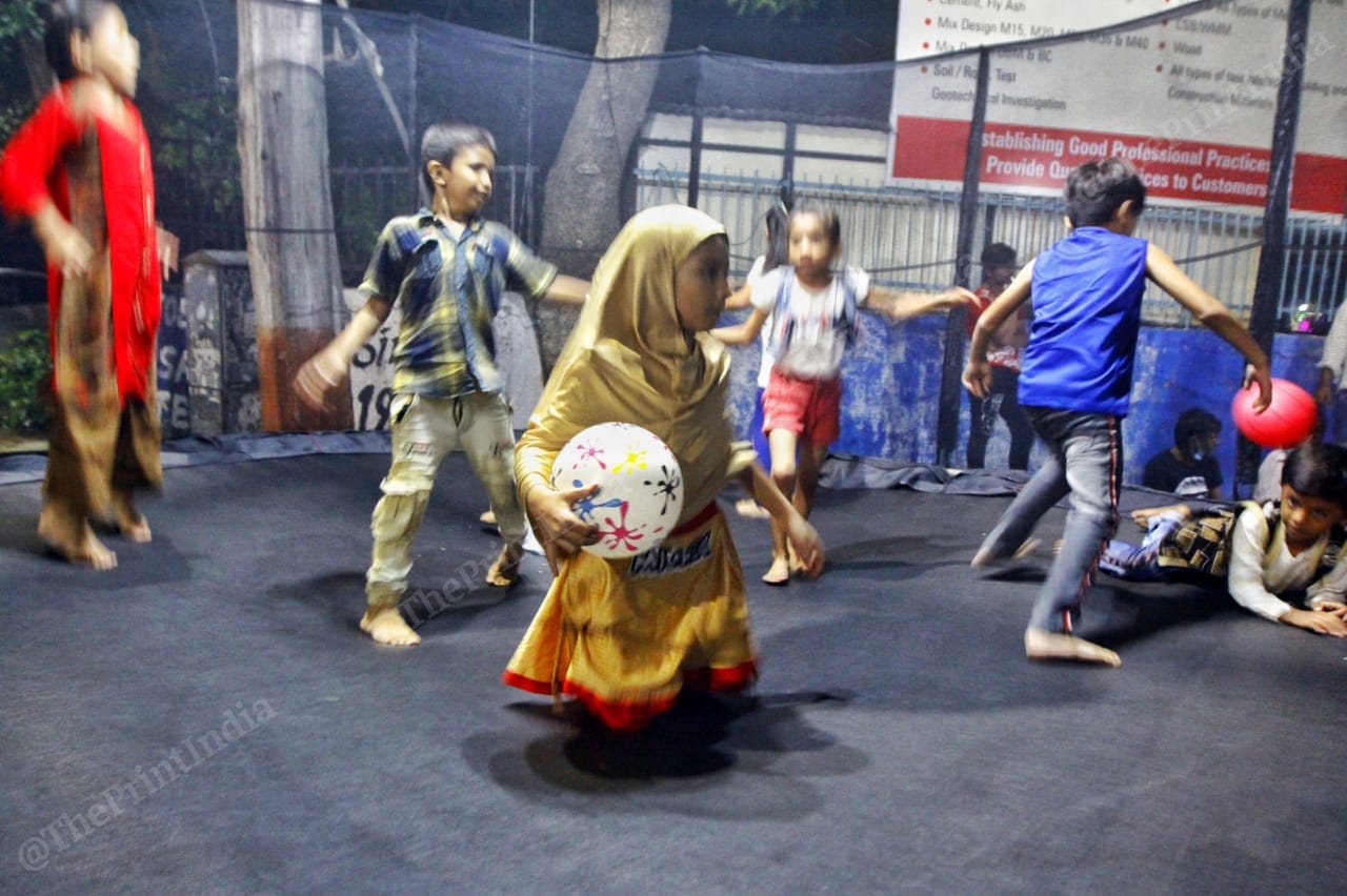 Kids play inside the play area in Law Garden | Photo: Praveen Jain | ThePrint