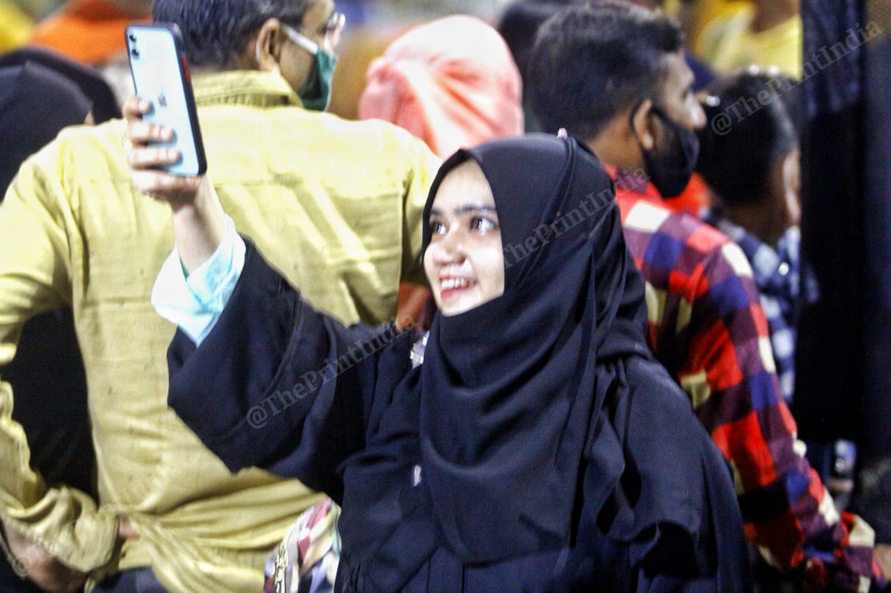 A girl clicks selfie in the Law Garden | Photo: Praveen Jain | ThePrint