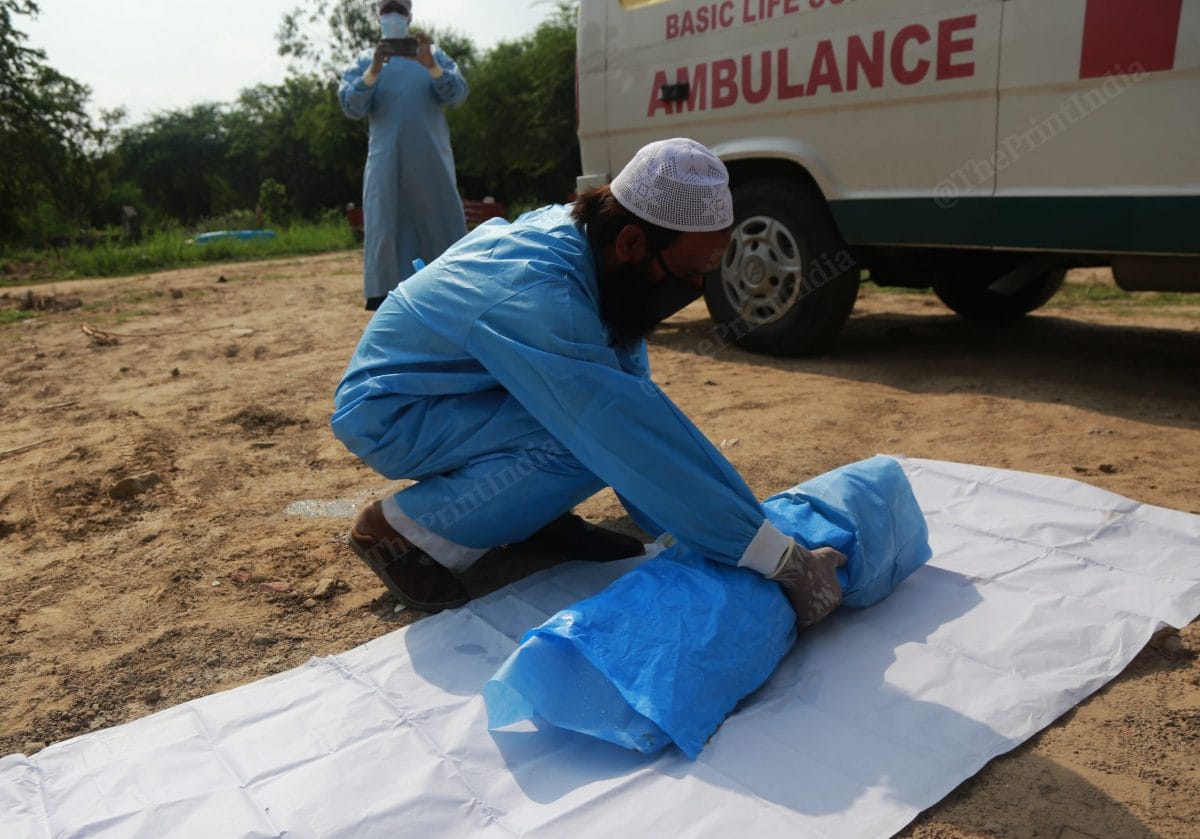 Imam Wasim put Azhar on a white cloth before the prayer | Photo: Manisha Mondal | ThePrint