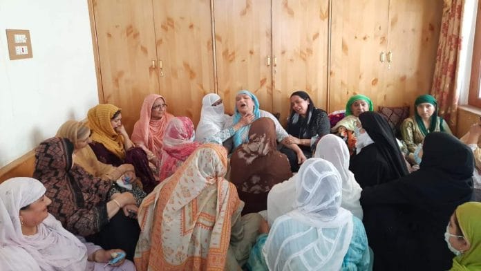 Bashir Khan's widow is consoled by her relatives and neighbours at their house in Srinagar | Azaan Javaid | ThePrint