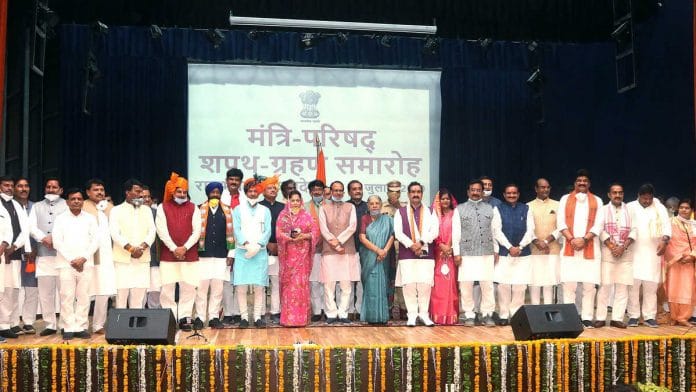 Madhya Pradesh CM Shivraj Singh Chouhan and acting Governor Anandiben Patel with the newly sworn-in council of ministers | Photo: ANI