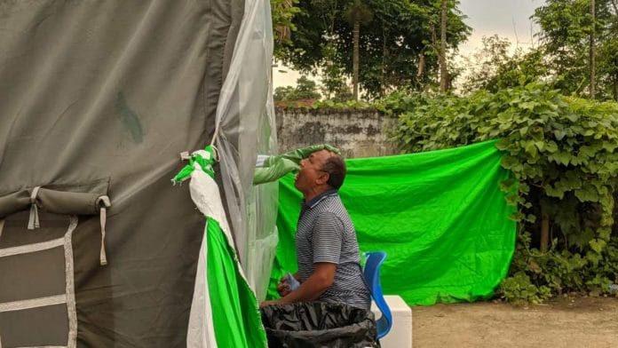 An Assam Rifles trooper is tested for Covid-19 at a centre in Dimapur, Nagaland | Yimkumla Longkumer