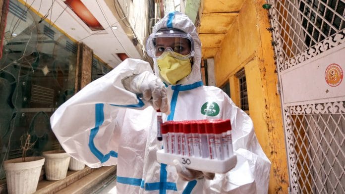 A health worker with Covid-19 samples (representational image) | Photo: ANI