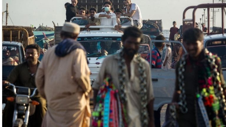 Millions in Pakistan face new Covid risk as they travel home for Eid