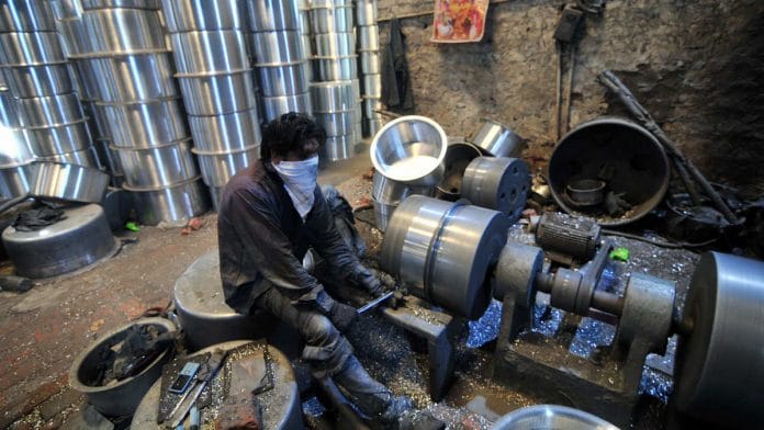 A worker at a utensil factory in Jammu in May | Photo: ANI