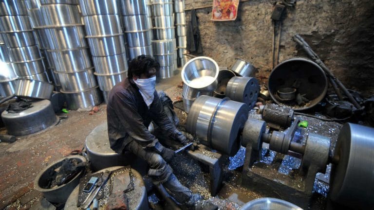 Industrial production contracts by 35% in May, but manufacturing shows signs of revival