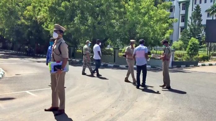 Police officers arrive at the Madurai Bench of Madras High Court in the matter related to the custodial death of a man and his son, in Chennai on 30 June