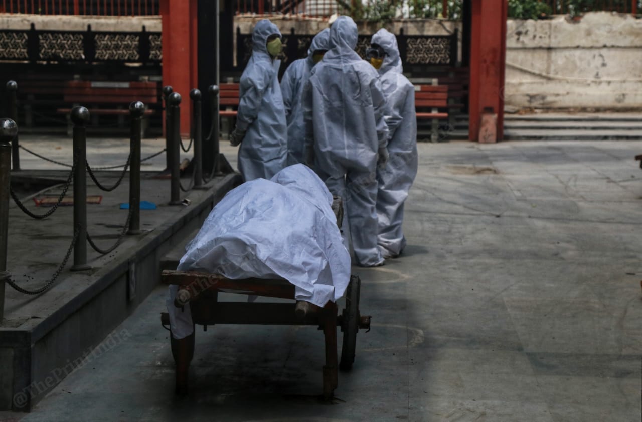 The body of a Covid deceased at Nigambodh Ghat in New Delhi. | Photo: Manisha Mondal/ThePrint