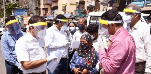 Kiran Dighavkar (in pink shirt) during one of his field visits | By special arrangement
