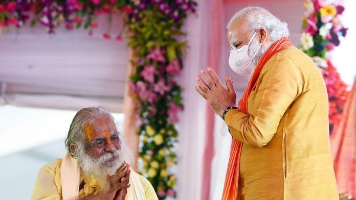 Prime Minister Narendra Modi greets President of Ram Mandir Trust Nitya Gopal Das at the foundation stone laying ceremony of 'Ram Temple, in Ayodhya on 5 August | ANI
