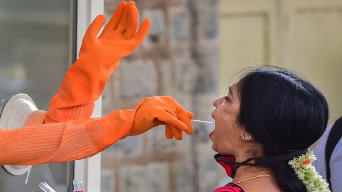 A woman is tested for Covid-19 in Bengaluru | Representational image | PTI file photo