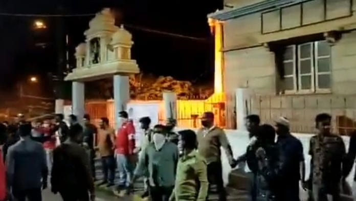 Muslims form human chain to save a temple from rioters in Bengaluru | Videograb | Twitter