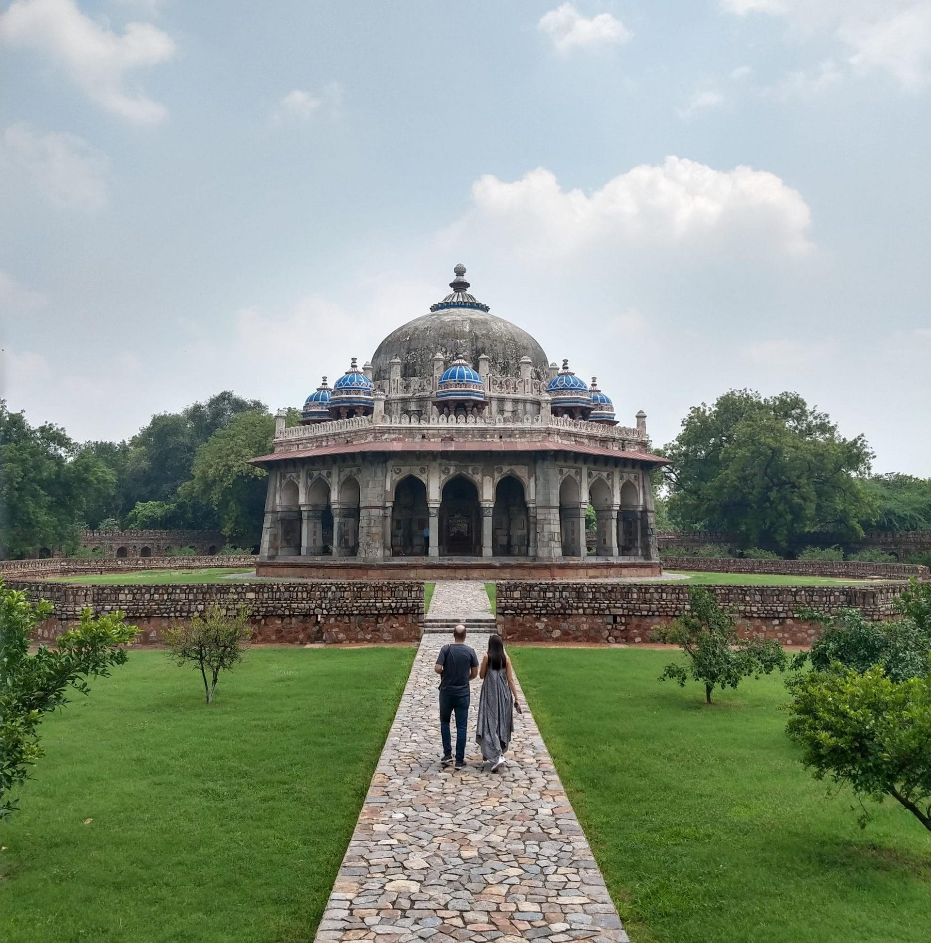 A couple walks towards Isa Khan's tomb in the Humayun's tomb complex | Photo: Shubhangi Misra | ThePrint