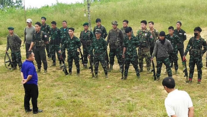 Three sections of the ‘Kuki Army’ at Camp Hermon in Tengnoupal district of Manipur undergoing a briefing session | By special arrangement