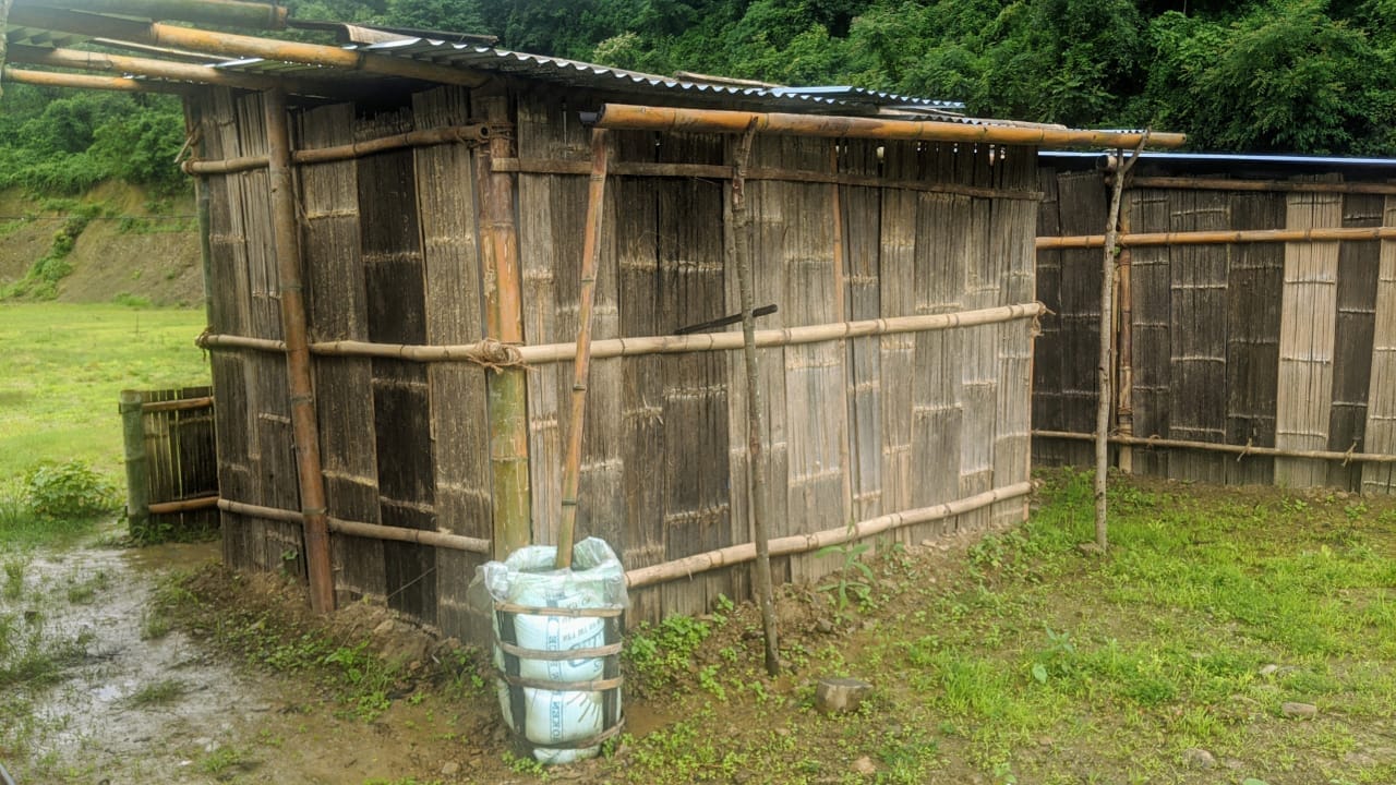 Bamboo baskets with plastic sheets are placed outside each of the 14 huts to collect rainwater | Yimkumla Longkumer | ThePrint
