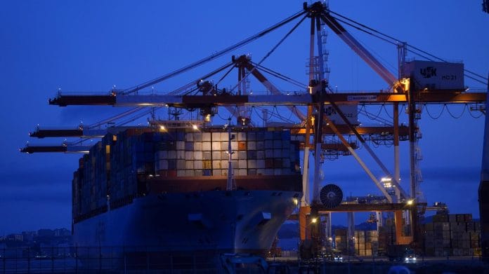 The Maersk Eindhoven container ship sits moored next to gantry cranes at a shipping terminal in Yokohama, Japan, on 19 July | Photo: Toru Hanai | Bloomberg
