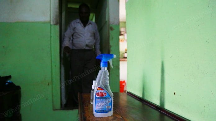 A bottle of sanitiser kept outside a room at one of the brothels of GB Road | Manisha Mondal | ThePrint