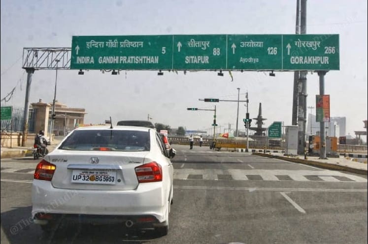 Judge S.K. yadav on his way to Ayodhya Prakaran court to deliver the verdict on Babri Masjid demolition case. His car passing from under a signboard which mentions Ayodhya | Photo: Praveen Jain | ThePrint 