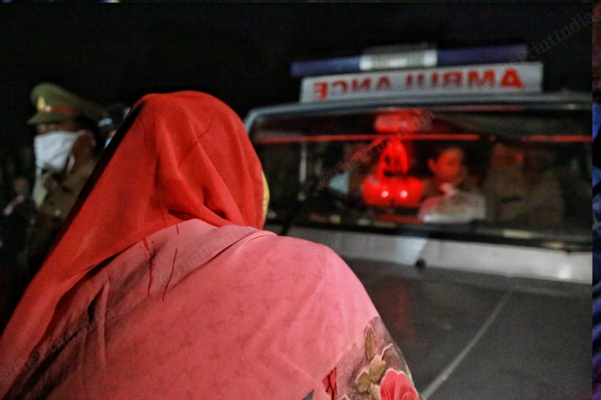 The 20 year old girls relatives surrounded the ambulance when it did not stop near their home | Photo: Manisha Mondal |ThePrint