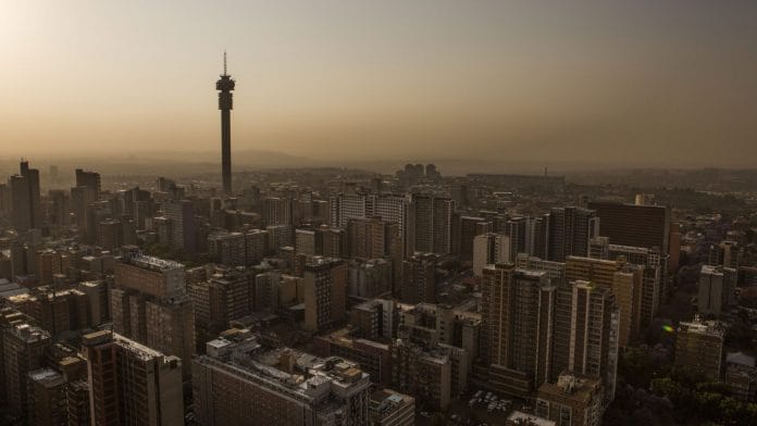 The Hillbrow Tower, operated by Telkom SA SOC Ltd., left, stands on the city skyline at dusk in Johannesburg, South Africa (Representational image) | Photographer: Guillem Sartorio/Bloomberg