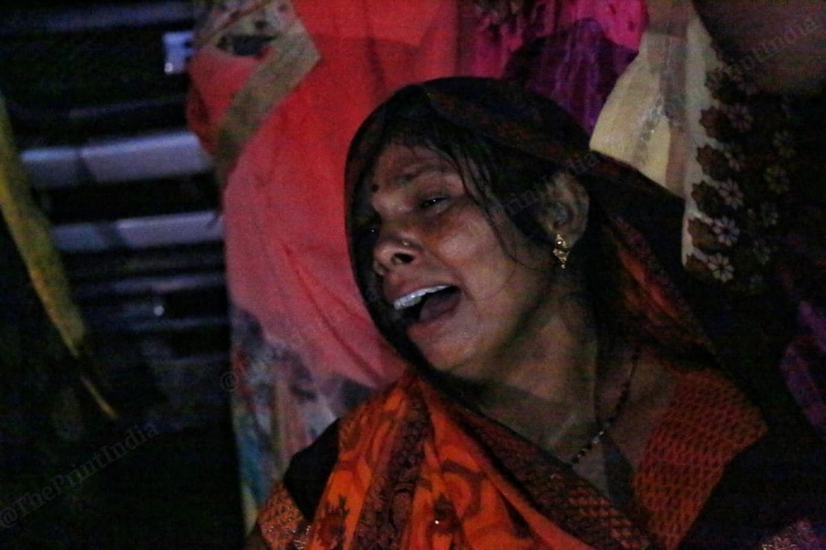 Women of the family came out to help the family | Photo: Manisha Mondal | ThePrint