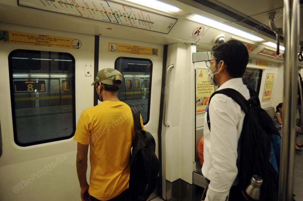 Passengers are given strict instructions to maintain adequate physical distance in the queue to board and disembark the metro, and trains will halt for a longer time at stations to facilitate this | Suraj Singh Bisht | ThePrint