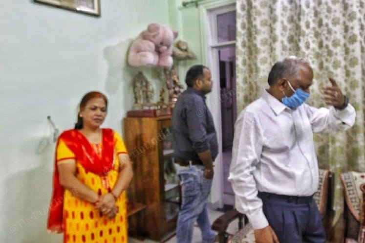 Wife Urmilla, son Abhishek and Yadav prepares for his departure | Photo: Praveen Jain | ThePrint
