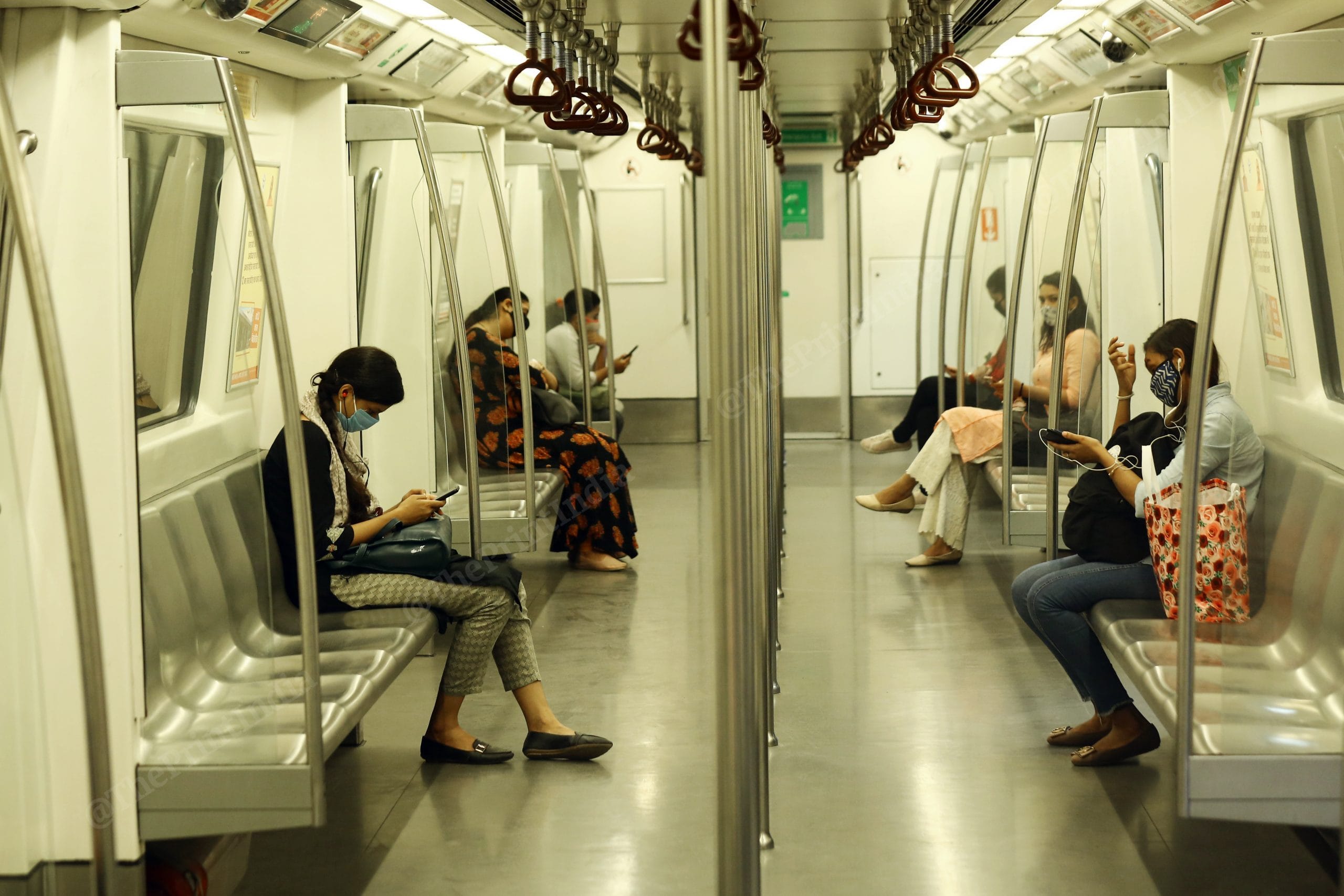 On the first day of the metro services resuming, passengers were extremely careful about distancing, carrying their own sanitisers, and wearing masks | Suraj Singh Bisht | ThePrint