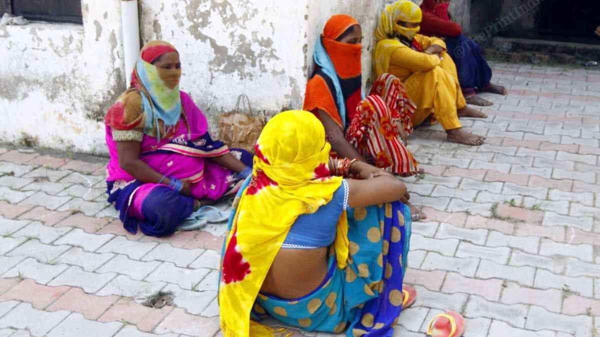 Woman wait as health teams in Bakarpur, Mohali, carry out awareness drive on Covid | Praveen Jain | ThePrint