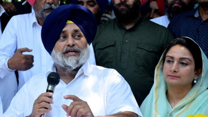 Former Union minister Harsimrat Kaur Badal (right) with her husband, Shiromani Akali Dal chief Sukhbir Singh Badal | File photo: ANI